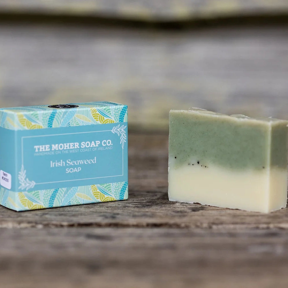Bar of soap and packaging from The Mohr Soap Co on a wooden surface