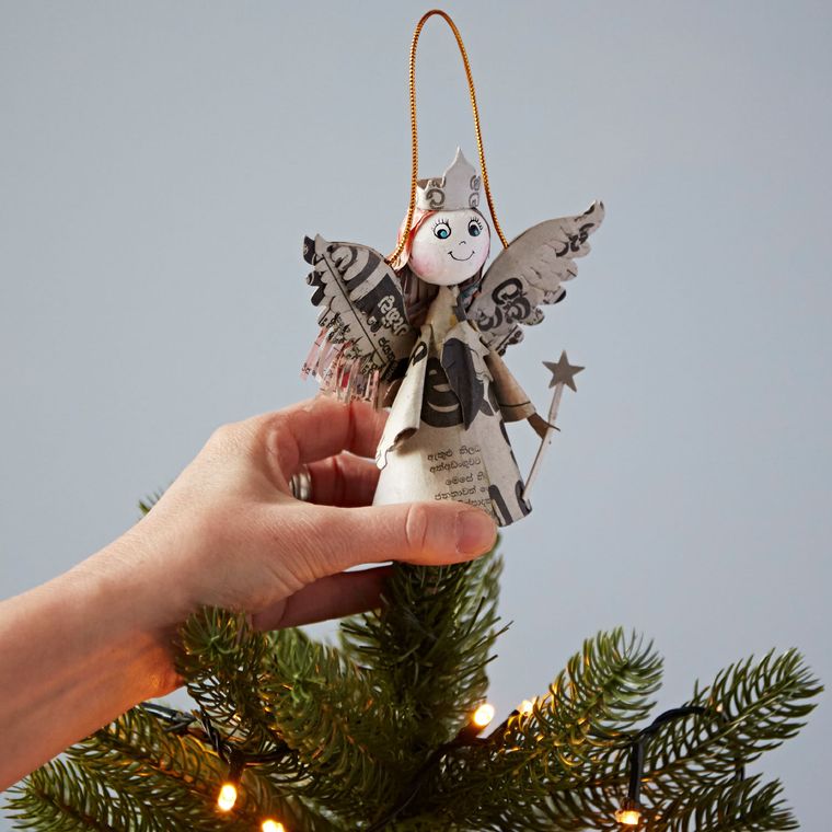Recycled newspaper angel decoration