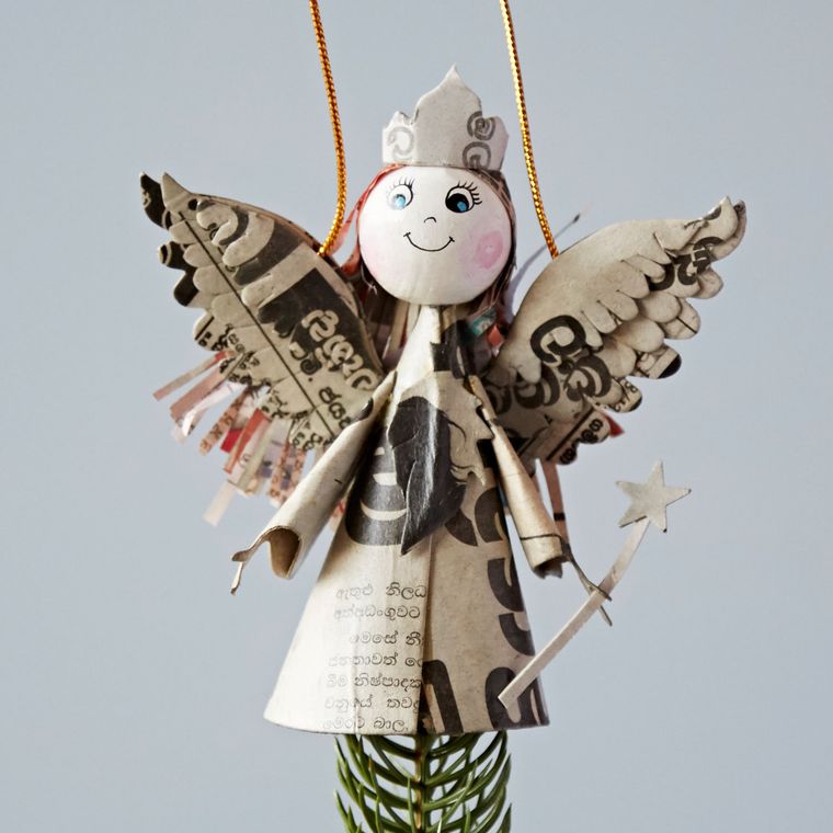 Recycled newspaper angel decoration