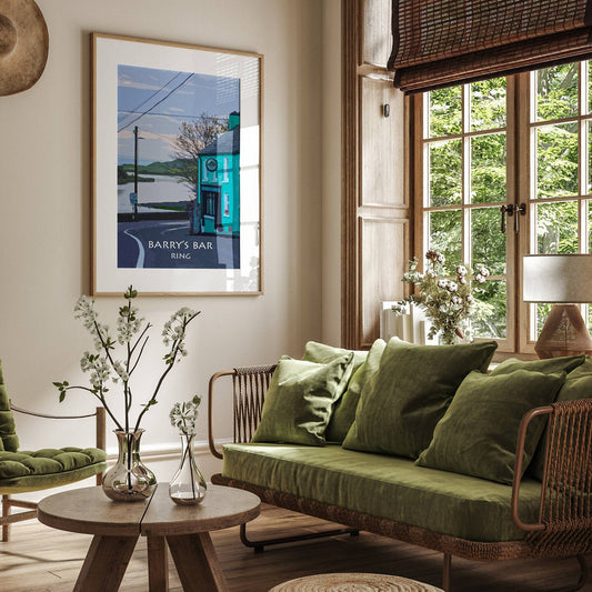 Living room with green sofa, wooden coffee table, and framed picture on wall.