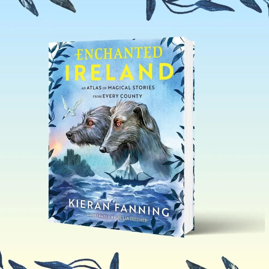 Book titled 'Enchanted Ireland' by Kieran Fanning on a light blue and beige gradient background with leaf decorations.